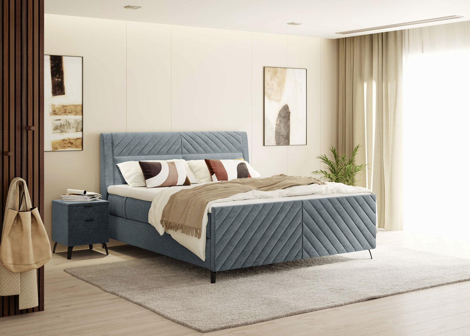 Boxspringbett 180x200 in einem modernen Schlafzimmer, seitliche Perspektive, mit blauer Polsterung und dekorativen Kissen.