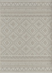Vooraanzicht van een rechthoekig tapijt in beige en crème met een geweven etnisch patroon van ruitjes en borders