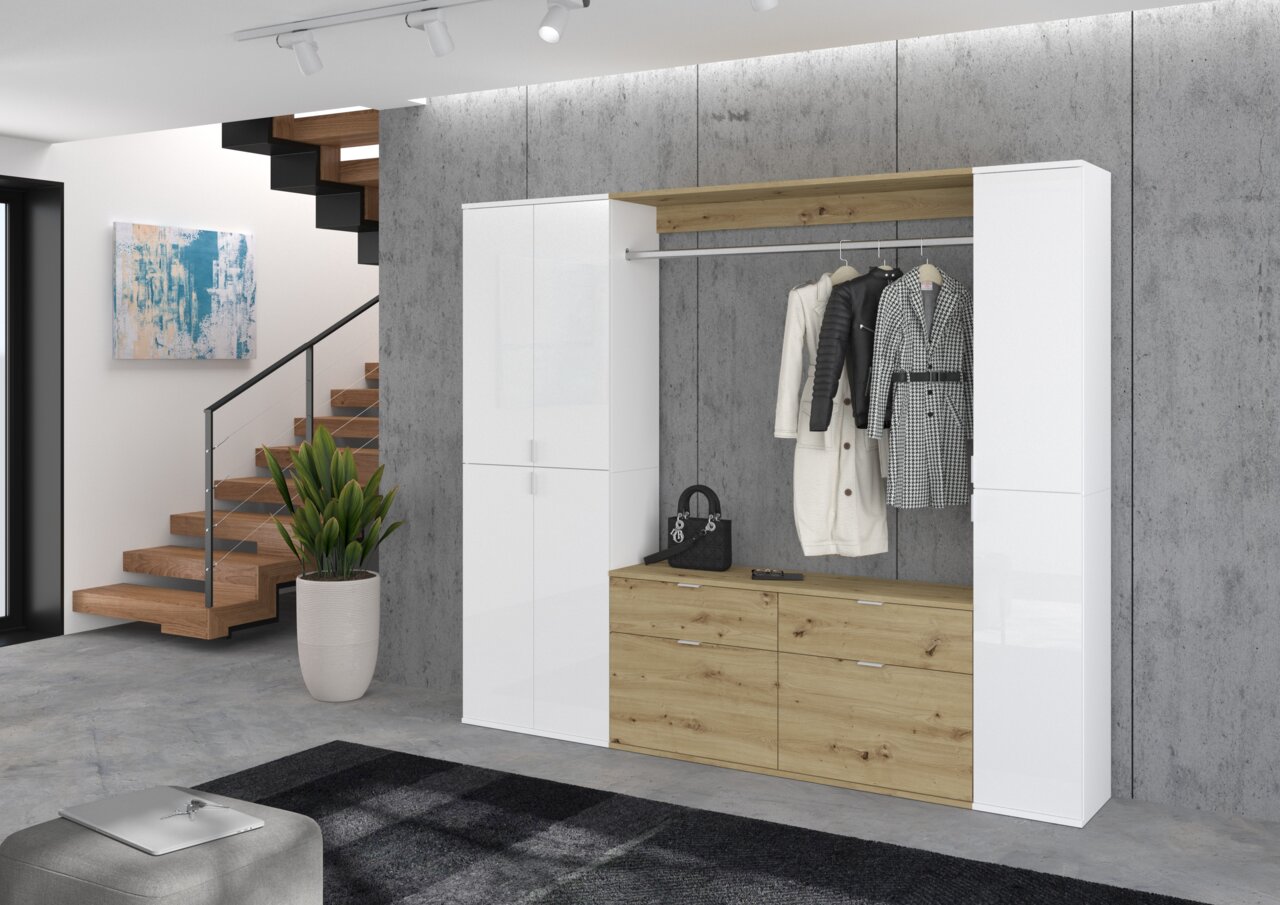 Moderne Garderobenkombination in Weiß und Holzoptik, frontal fotografiert, mit Kleiderstange, Schubladen und seitlichen Schränken.