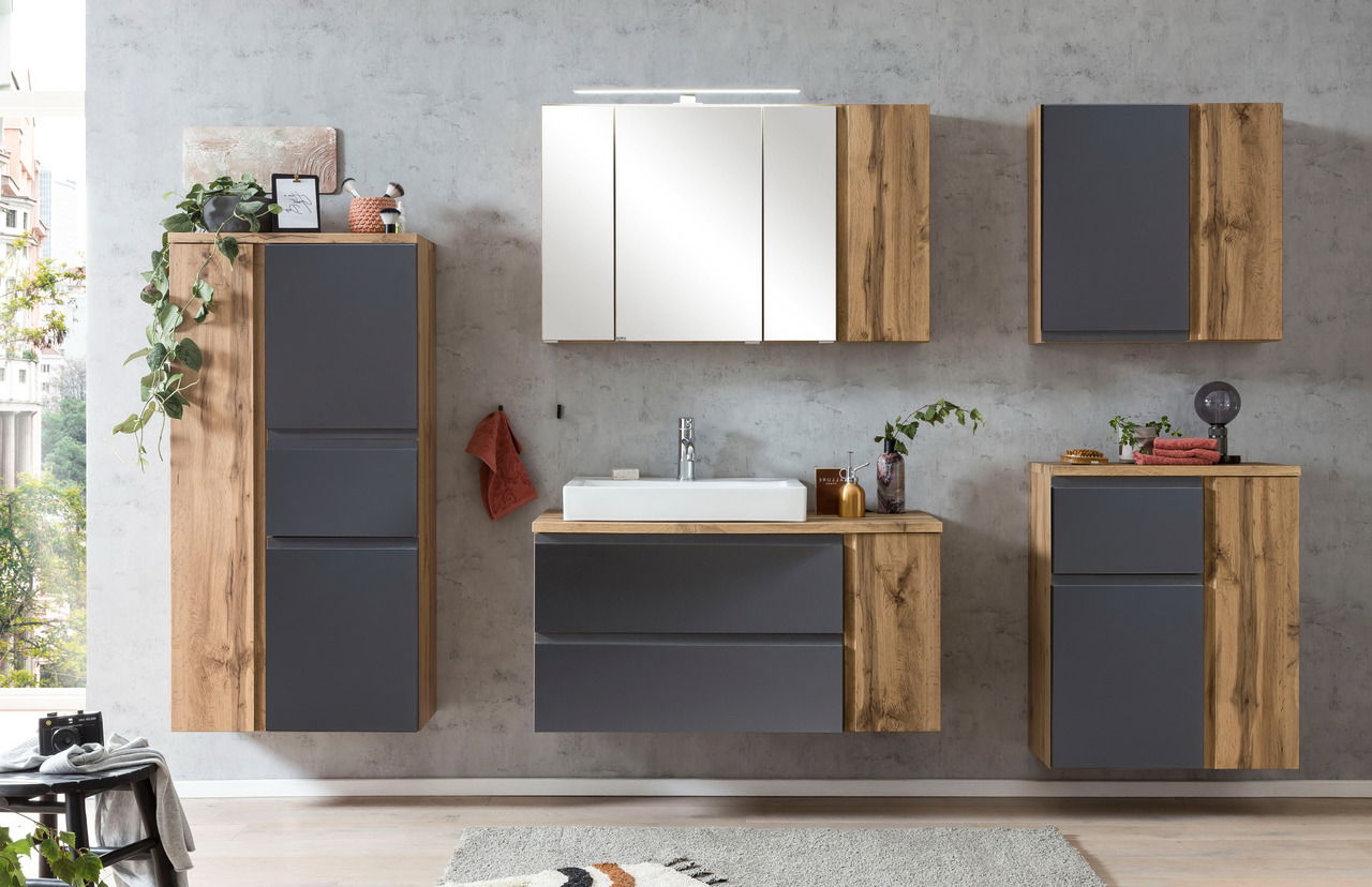 Moderner Midischrank 65 cm in Holzoptik mit grauen Fronten, frontal abgebildet in einem stilvollen Badezimmer.