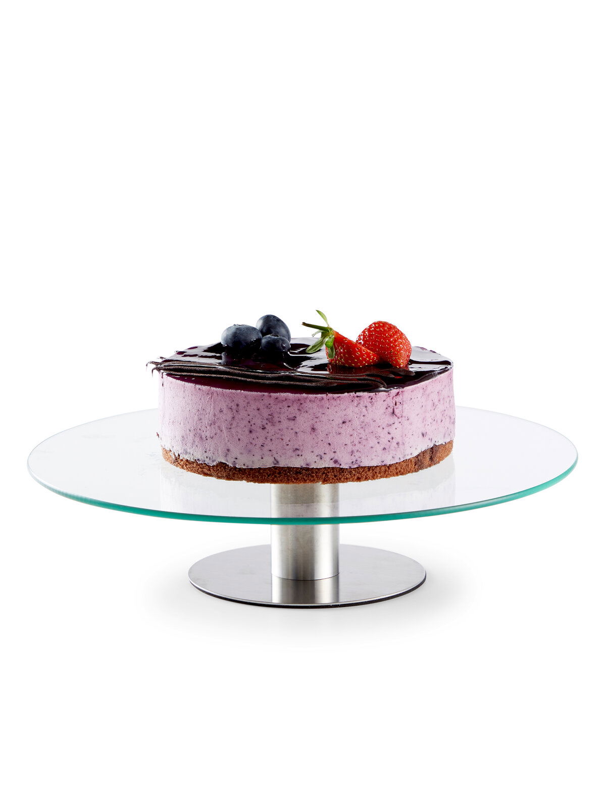 Tortenplatte aus Glas mit einer dekorativen Torte, seitliche Perspektive