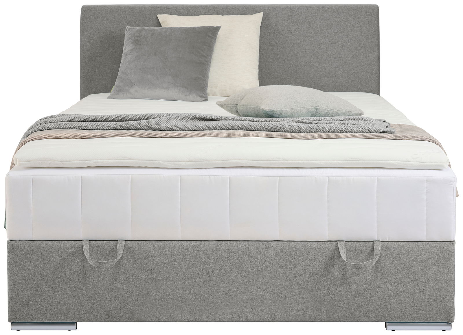 Frontale Ansicht eines grauen Boxbetts mit Kopfteil, dekoriert mit mehreren Kissen und einer Decke.