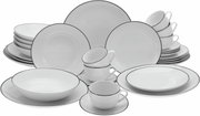 Kombiservice 30-teilig Luna Black L, bestehend aus weißen Tellern, Schalen und Tassen mit schwarzem Rand, frontal abgebildet.