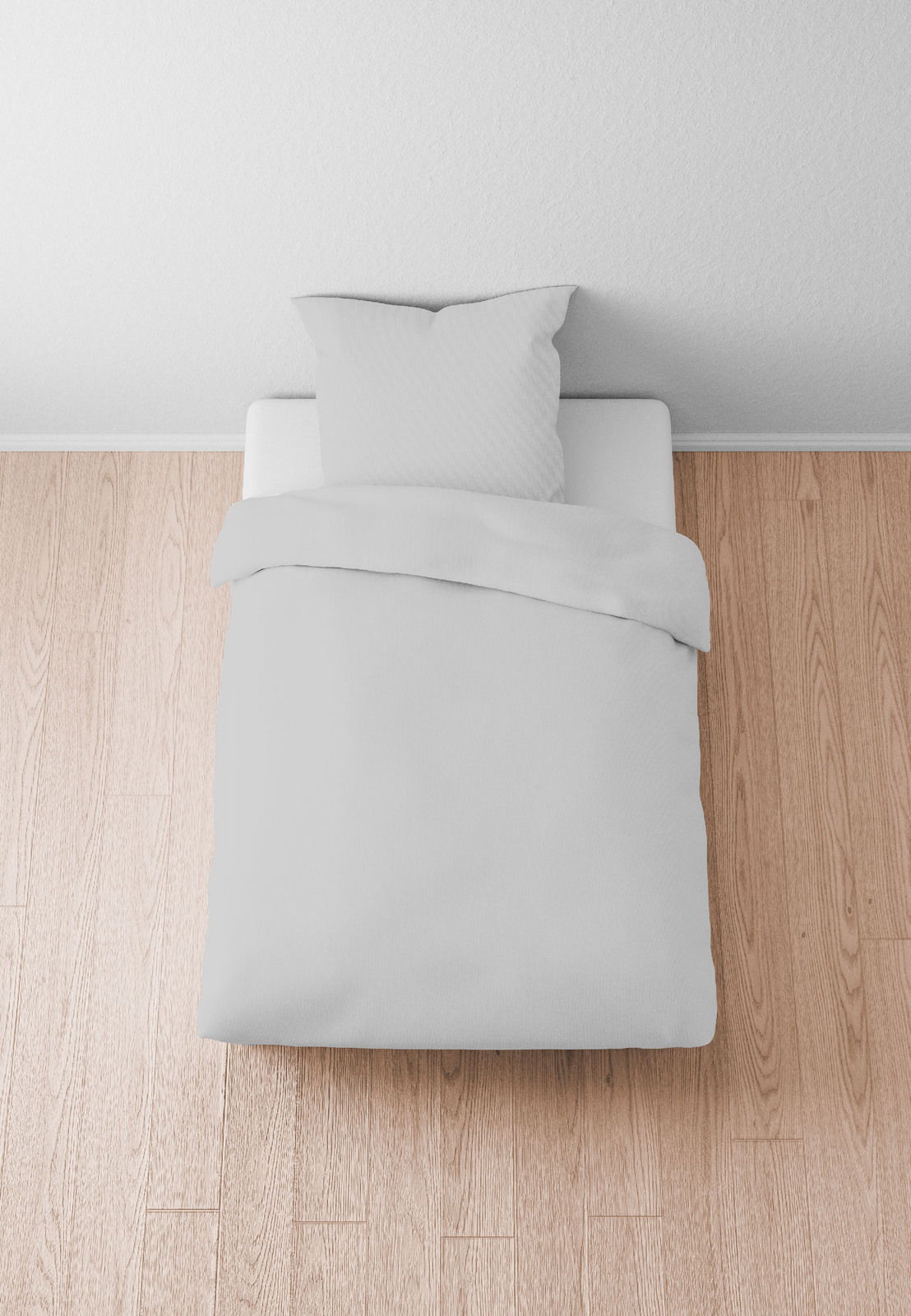 Biberna Bettwäsche 155x220cm Bettwäsche-Set in Weiß auf einem Bett, von oben fotografiert, auf einem Holzboden.