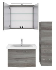 Badblock-Set bestehend aus einem Waschbeckenunterschrank mit zwei Schubladen, einem Spiegelschrank mit offenen Türen und einem hohen Seitenschrank, frontal abgebildet.