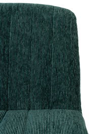 Nahaufnahme eines Sessels mit grünem, geripptem Stoffbezug, Vorderansicht