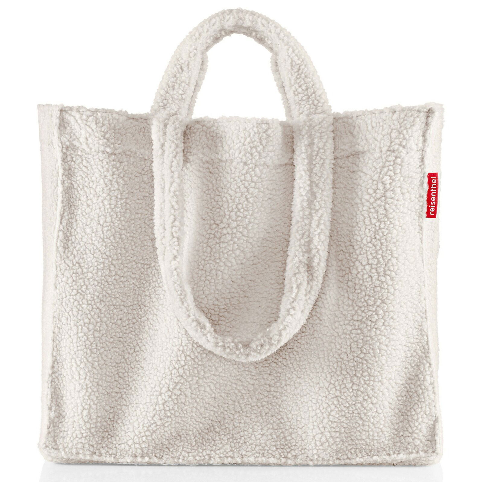 Weiße, flauschige Einkaufstasche aus Stoff mit zwei Henkeln, Vorderansicht