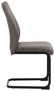 Moderner Schwingstuhl in Seitenansicht mit grauem Polster und schwarzem Metallgestell.