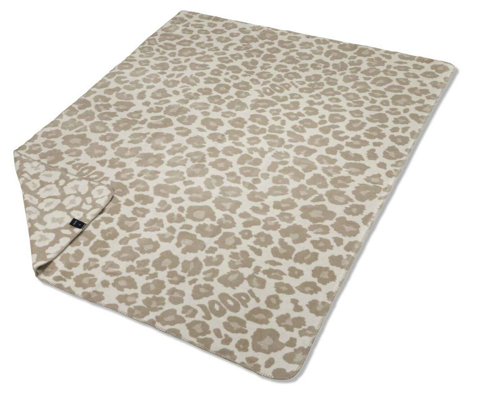 Wohndecke mit Leopardenmuster in Beige und Weiß, perspektivisch von oben fotografiert