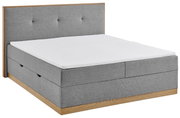 Graues Boxbett mit Holzdetails, seitliche Perspektive