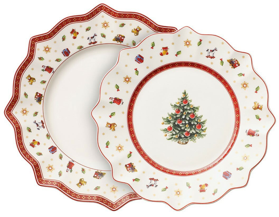 Zwei weihnachtlich dekorierte Teller mit rotem Rand und Weihnachtsbaum-Motiv, von oben betrachtet.