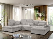Graue Ecksofa mit verstellbaren Kopfstützen in einem modernen Wohnzimmer, seitliche Perspektive