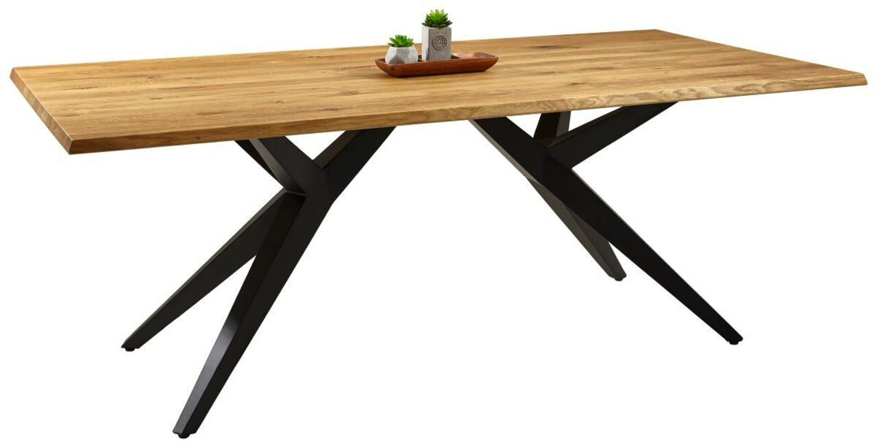 Moderner Esstisch mit Holzplatte und schwarzen Metallbeinen, seitliche Perspektive