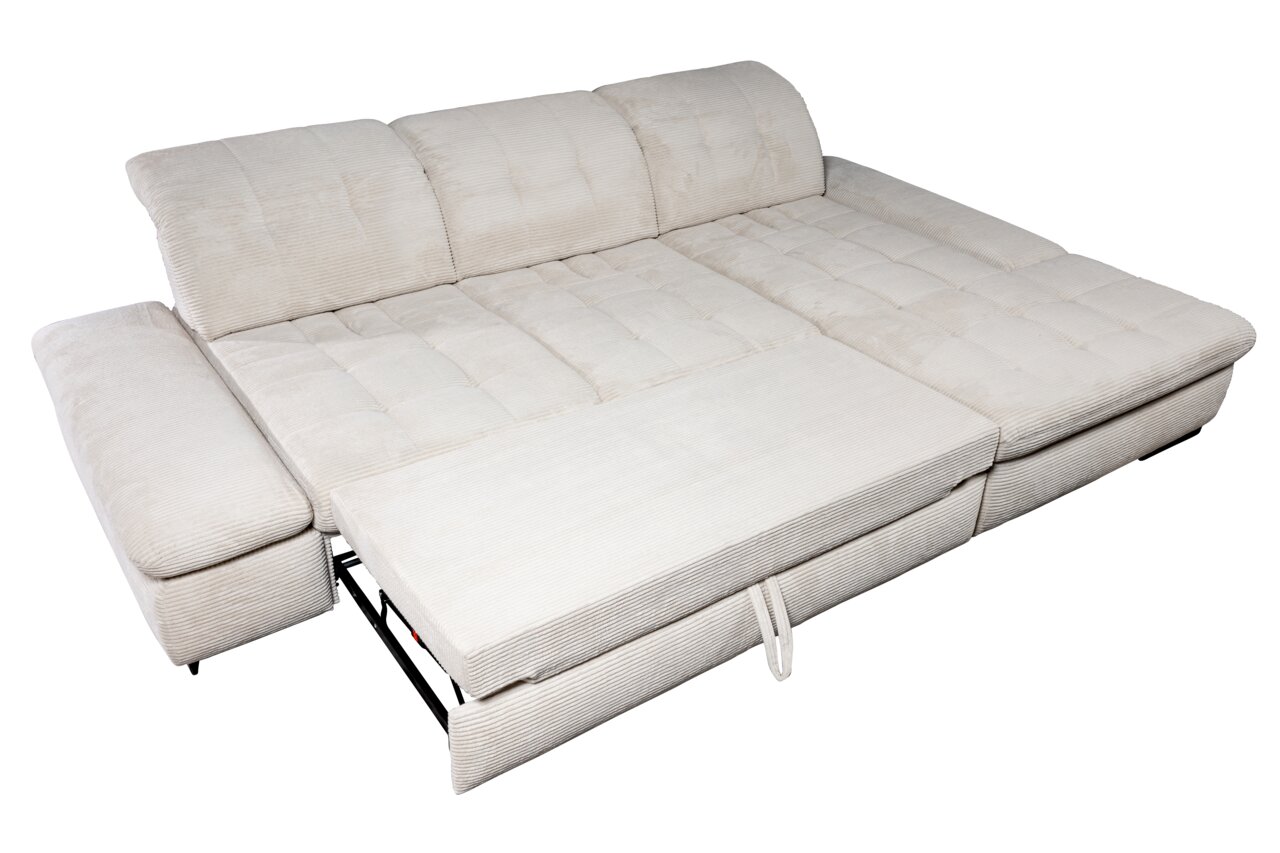 Beige hoekbank met uitschuifbaar liggedeel, gezien van bovenaf.