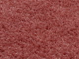 Nahaufnahme eines weichen, runden Teppichs in Rosa, Texturperspektive