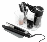 Transparenter Organizer für Haarwerkzeuge mit Fächern, gefüllt mit Föhn, Rundbürste und Haarglätter, aus der Vorderansicht.