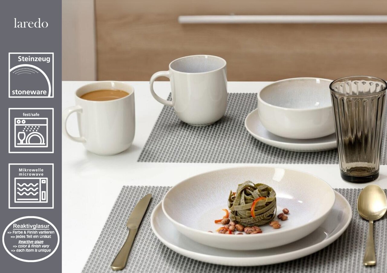Frühstücksset Laredo auf einem Tisch, bestehend aus Tassen, Schalen und Tellern in einer modernen Tischdekoration, seitliche Perspektive.
