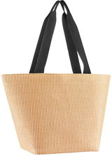 Shopper-Tasche aus Raffia in Beige mit schwarzen Henkeln, seitliche Perspektive