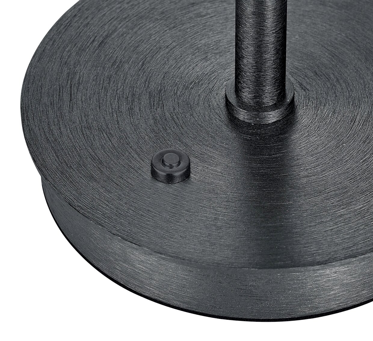 Nahaufnahme der Basis einer LED-Tischleuchte KLARA in schwarzem Metall mit einem runden Schalter, von oben betrachtet.