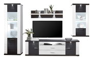 Moderne Wandkombination in Schwarz und Weiß mit zwei Vitrinen, einem TV-Schrank und einem Wandregal, frontal betrachtet.