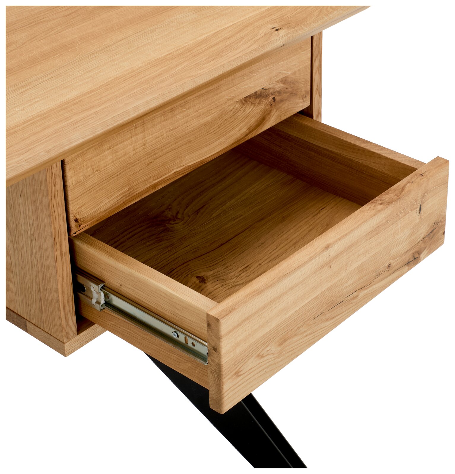 Close-up van een houten bureau met een open lade, gezien vanaf de zijkant