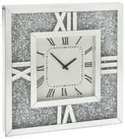 Silberne Wanduhr mit römischen Ziffern und glitzerndem Rahmen, seitliche Perspektive