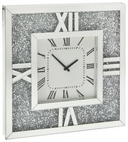 Silberne Wanduhr mit römischen Ziffern und glitzerndem Rahmen, seitliche Perspektive