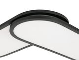 Nahaufnahme eines modernen LED-Panels mit schwarzem Rahmen und weißer Leuchtfläche, von unten betrachtet.