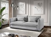 Graues Funktionssofa in einem modernen Wohnzimmer, seitliche Perspektive