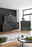 XORA Kommode MANO Moderne Wohnzimmermöbel in dunklem Grau, bestehend aus Kommode, Sideboard und Highboard, in einem stilvoll eingerichteten Raum mit Holzfußboden und großen Fenstern. Perspektive von vorne.