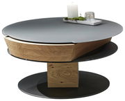 Moderner Couchtisch mit runder, grauer Tischplatte und Holzdetails, seitliche Perspektive