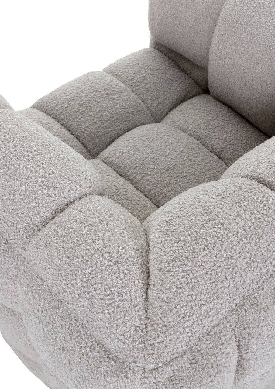 Nahaufnahme eines grauen, gepolsterten Drehsessels mit weicher Textur und quadratischem Muster, von oben betrachtet.