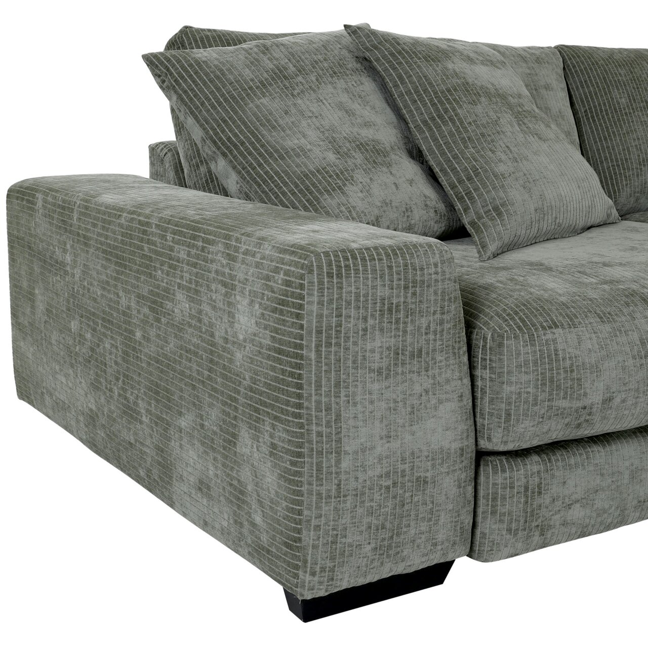 Grünes Ecksofa BASOS mit breiter Armlehne und weichen Kissen, seitliche Perspektive