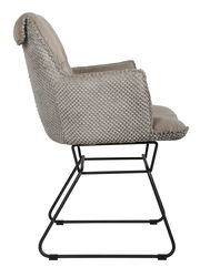 Seitenansicht eines Armlehnstuhls mit gepolstertem Sitz und Rückenlehne, sowie einem schwarzen Metallgestell.