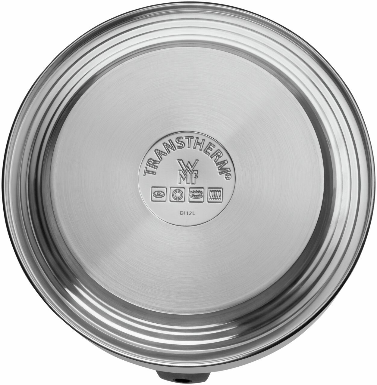 Ansicht von unten eines Flötenkessels mit TransTherm-Boden und WMF-Logo, geeignet für verschiedene Herdarten.