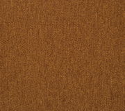 Nahaufnahme eines braunen Stoffmusters, das für einen Stuhl verwendet wird.