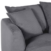 Graue Rundecke mit geripptem Stoffbezug und zwei Kissen, seitliche Perspektive