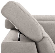 Nahaufnahme einer grauen Rundecke mit verstellbarer Kopfstütze, seitliche Perspektive