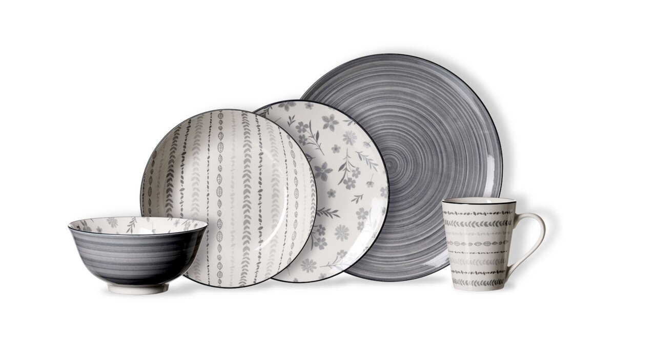 Kombiservice 30-tlg. in Grau und Weiß mit verschiedenen Mustern, bestehend aus Teller, Schüssel und Tasse, seitliche Perspektive