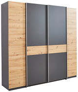Moderner Dreh- und Schwebetürenschrank mit vier Türen in Holzoptik und grauen Elementen, seitliche Perspektive