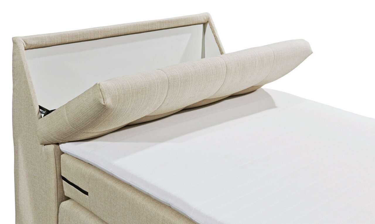 Beige Boxspringbett mit verstellbarem Kopfteil, seitliche Perspektive