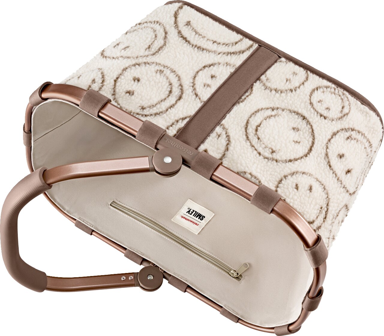 Klappbarer Baby-Bouncer/Schaukelstuhl mit beigem Stoffsitz, Reißverschlussfach und cremefarbenem Teddy-Bezug mit Smiley-Muster; Ansicht schräg von oben auf die Unterseite