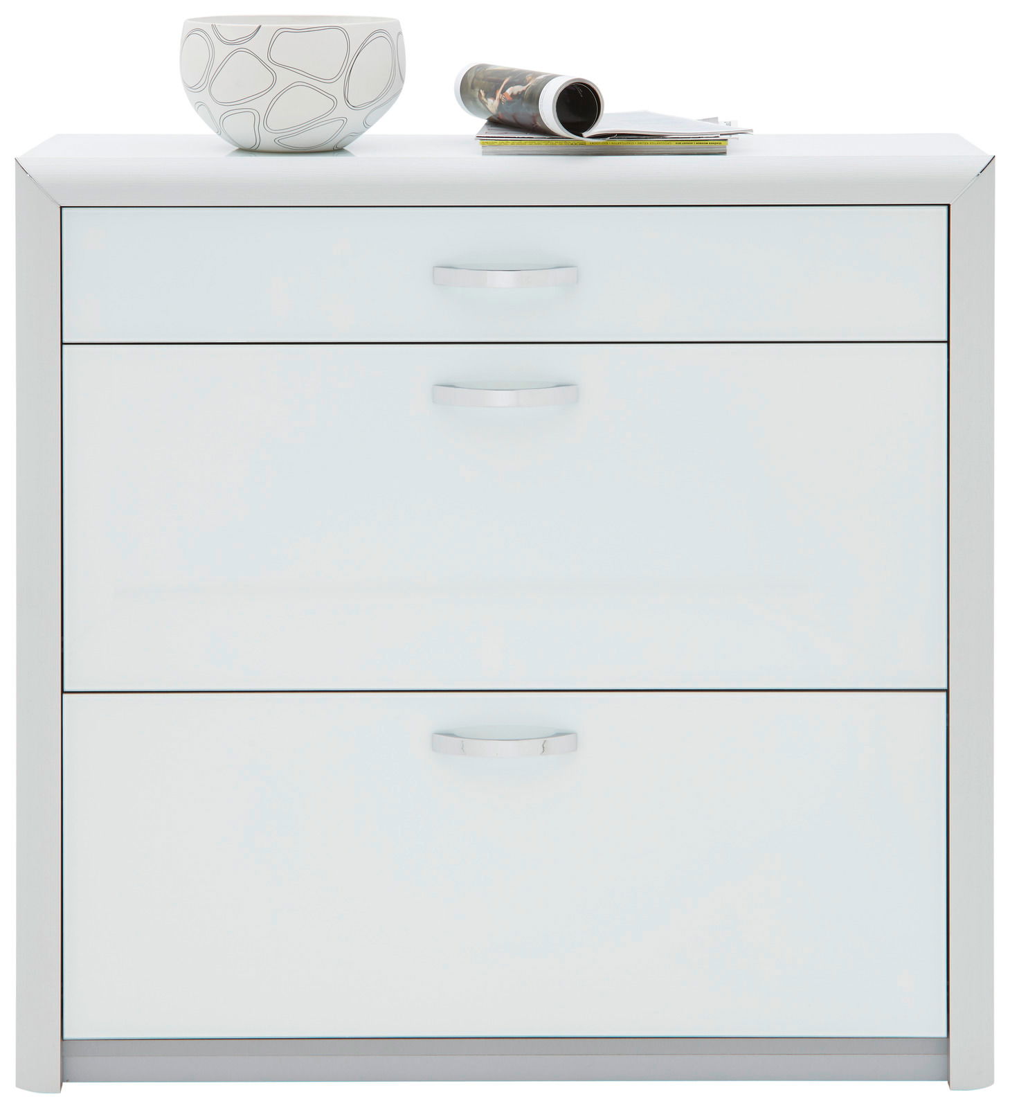 Moderner weißer Schuhschrank mit drei Schubladen, darauf eine dekorative Schale und eine Zeitschrift, Frontalansicht.