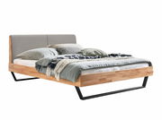 Modernes Bettgestell aus Holz mit grauem Kopfteil und schwarzem Metallrahmen, seitliche Perspektive