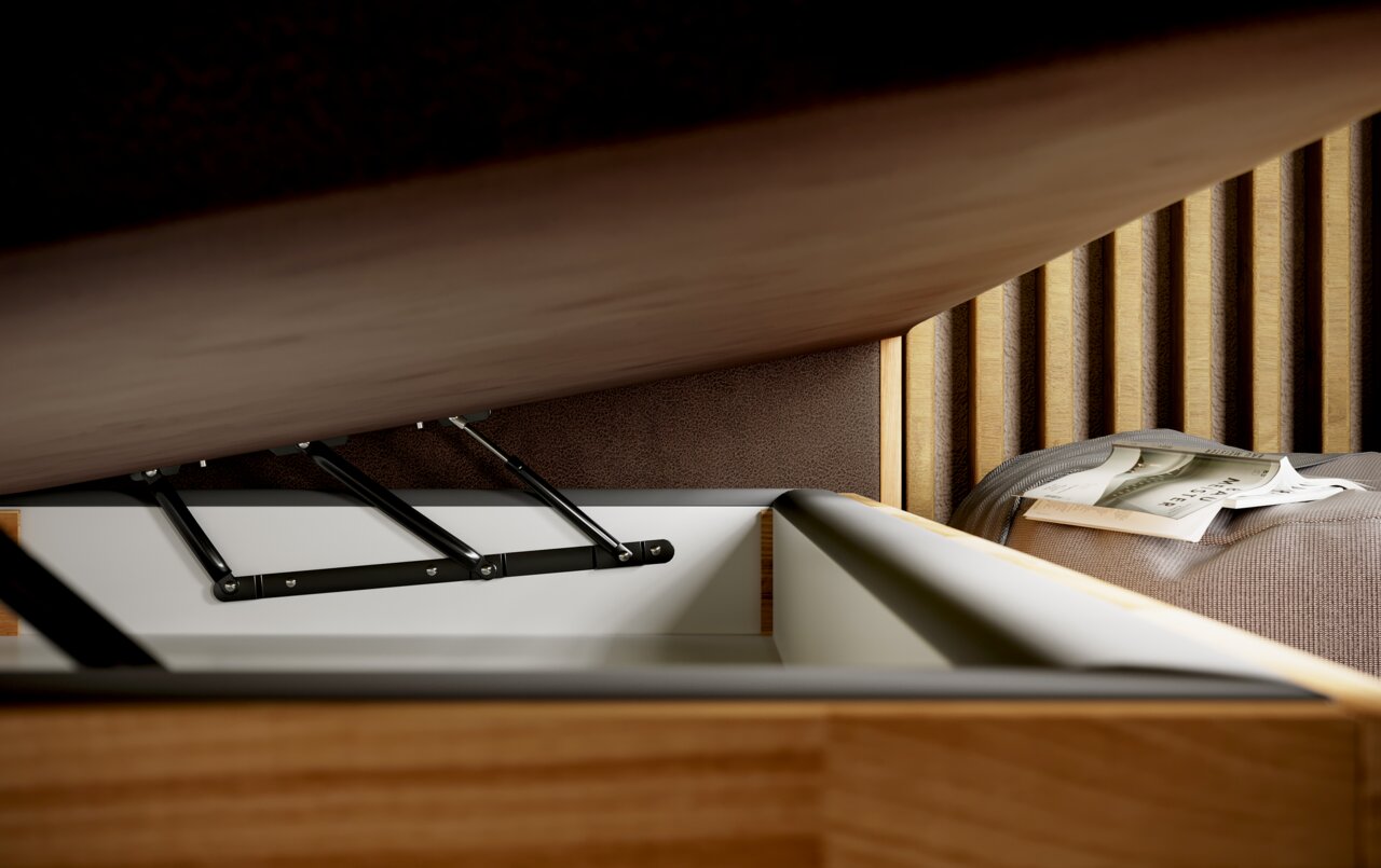 Nahaufnahme eines geöffneten Boxspringbetts mit Stauraum, seitliche Perspektive