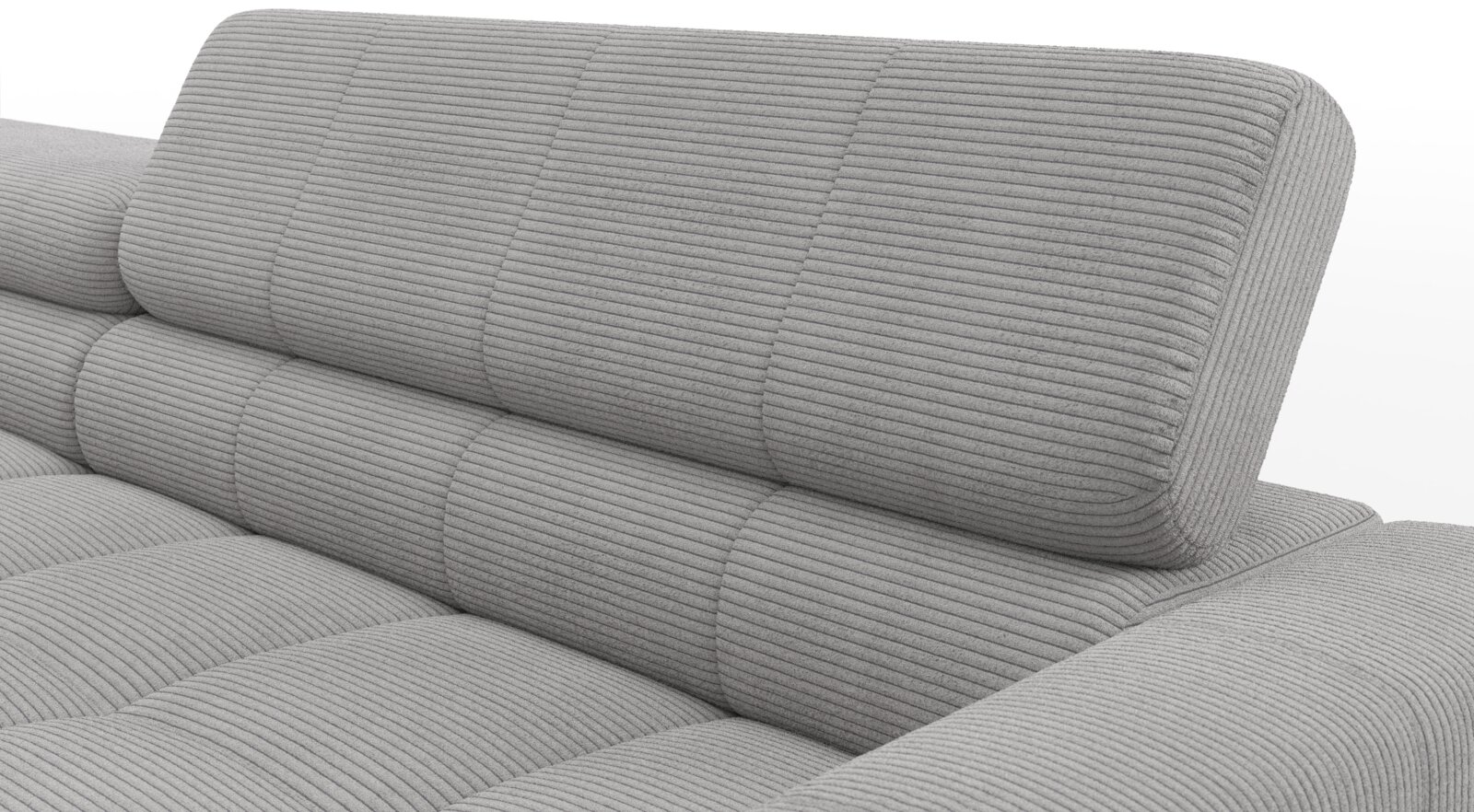 Close-up van een lichtgrijze ribfluwelen bank met gewatteerde rug- en zitkussens, schuin van voren bekeken
