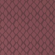 Nahaufnahme einer Wendebettwäsche mit rautenförmigem Muster in dunklem Rot.