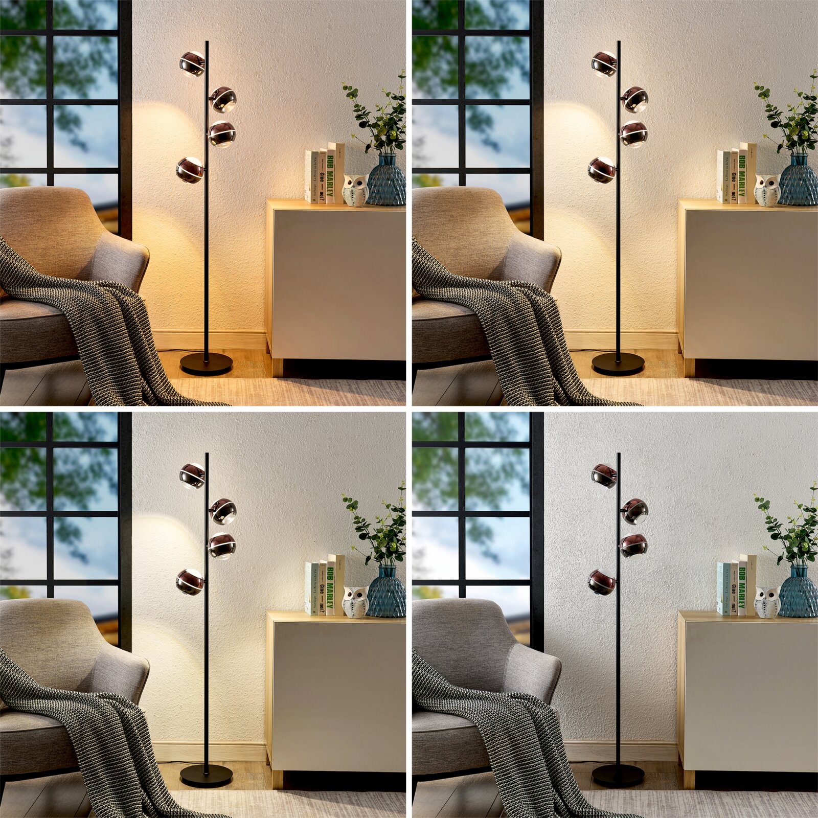 Moderne schwarze Stehleuchte mit vier kugelförmigen, kupferfarbenen Lampenschirmen neben Sessel und Sideboard im Wohnzimmer, frontale Perspektive