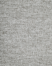 Nahaufnahme eines grauen Stoffmusters, das für einen Armlehnstuhl verwendet wird, aus der Vogelperspektive.