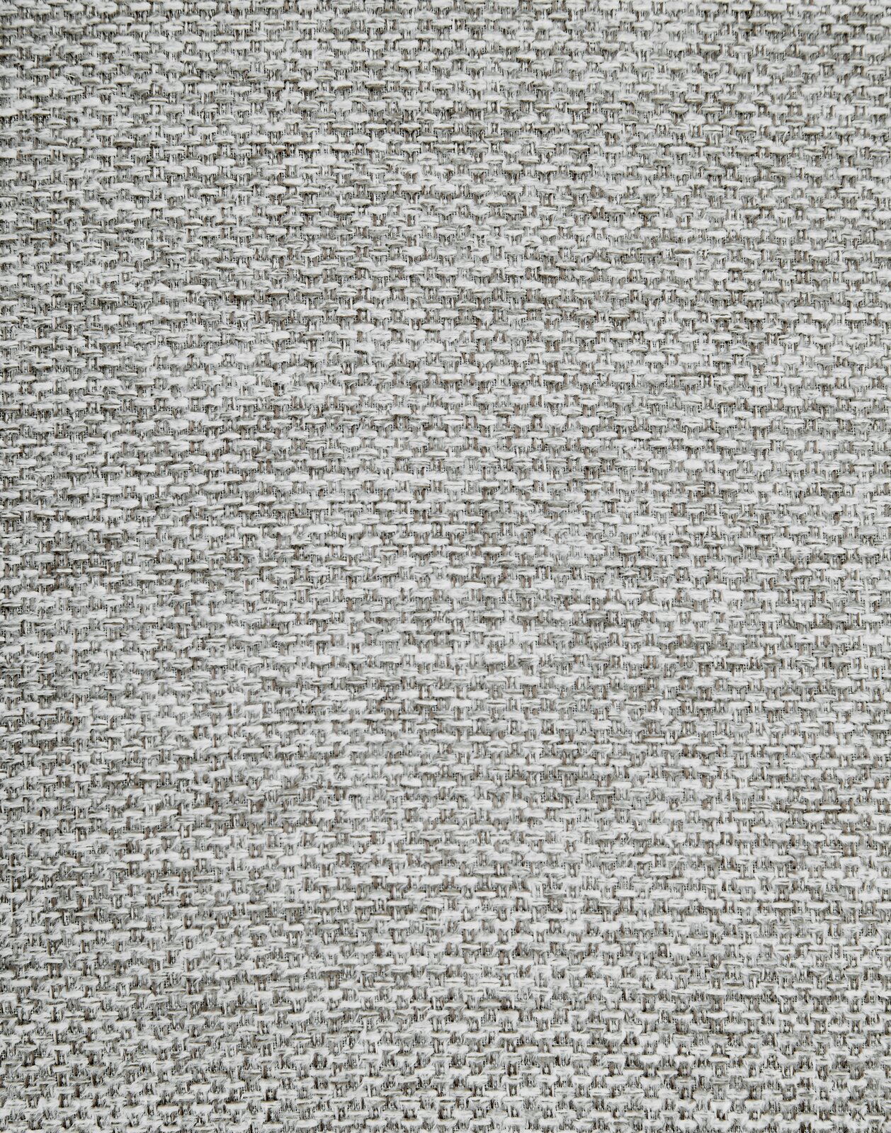 Z2 Armlehnstuhl DIETMAR Nahaufnahme eines grauen Stoffmusters, das für einen Armlehnstuhl verwendet wird, aus der Vogelperspektive.